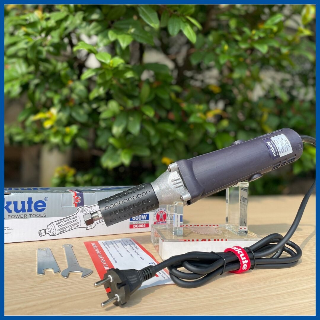 L'embalage et la Meuleuse Industrielle 600W 6mm - Makute